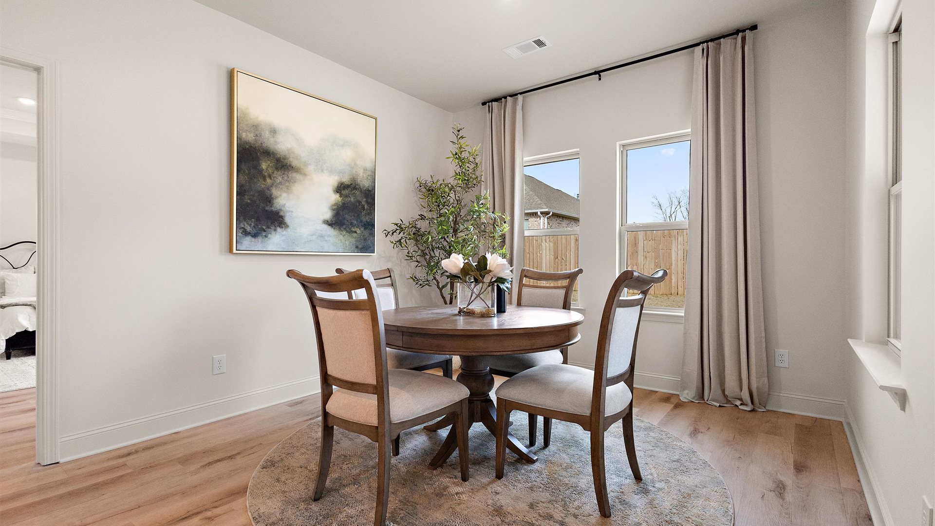 View from kitchen to dining area near backyard and patio access Horseshoe Bend