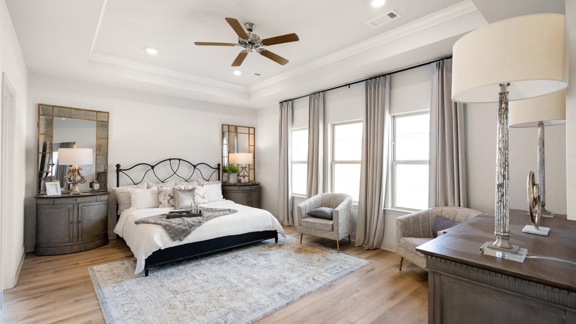 Primary bedroom features ample space, double windows, soft carpet, a stylish walk-in closet, and a private en suite bath Horseshoe Bend