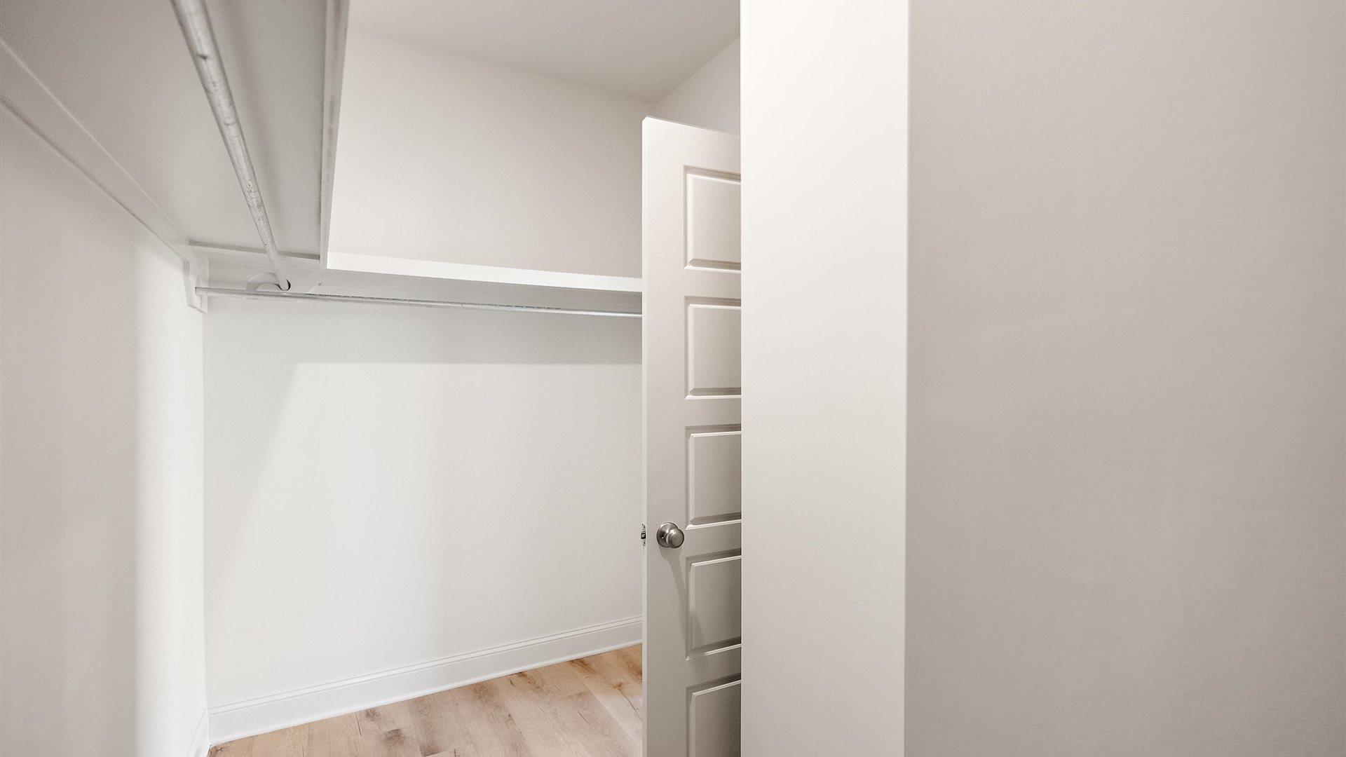 Interior view of the walk-in closet connected to the primary bedroom with spa-inspired ensuite and generous storage Horseshoe Bend