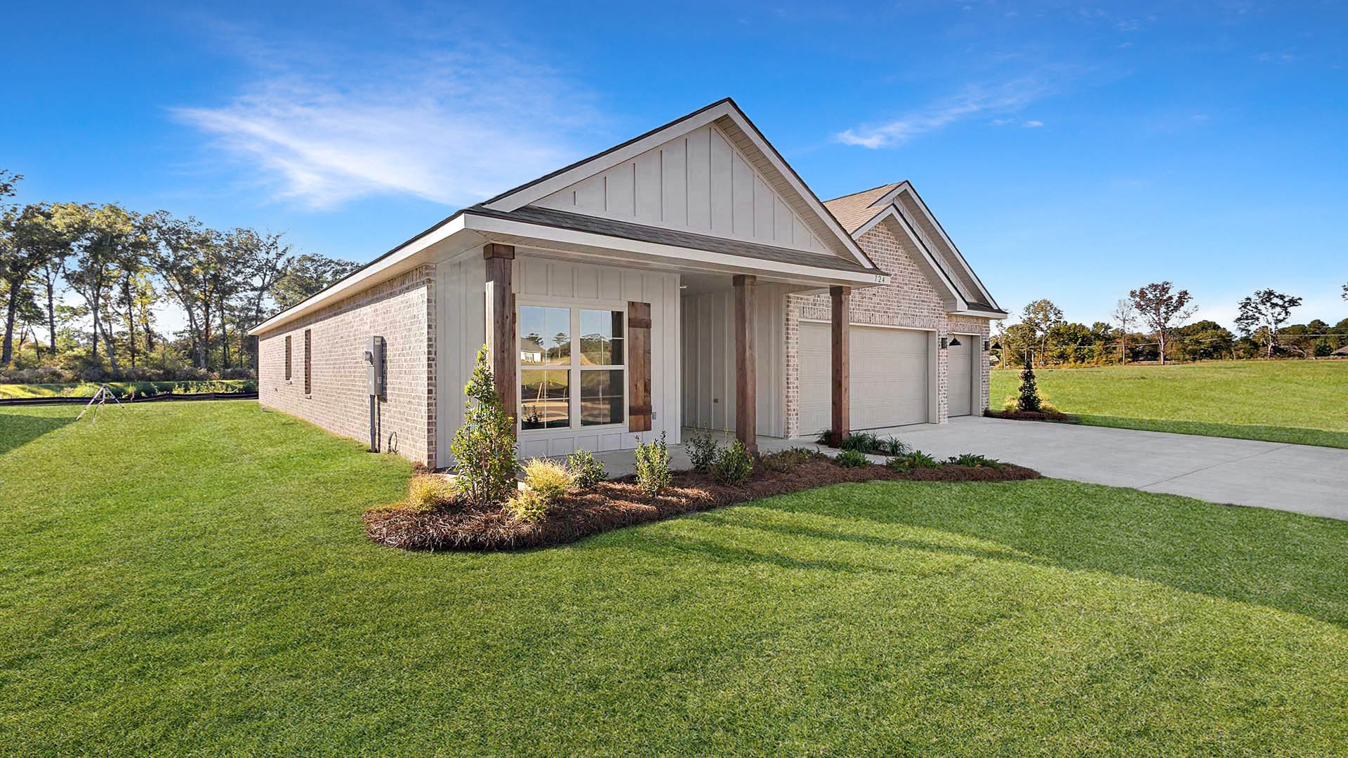 The Destin single-story home with a two-car garage., New home in Pearl, MS.