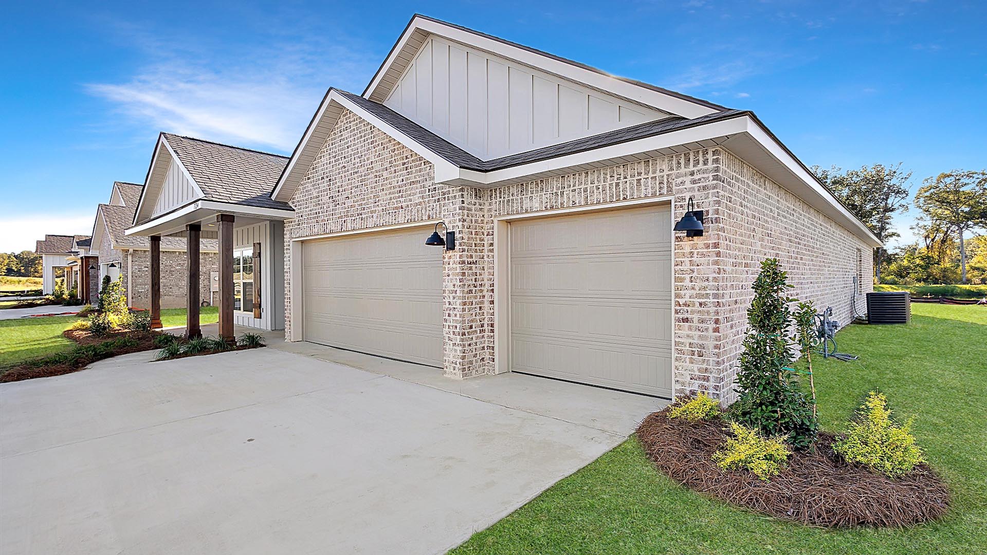 The Destin single-story home with a two-car garage., New home in Pearl, MS.