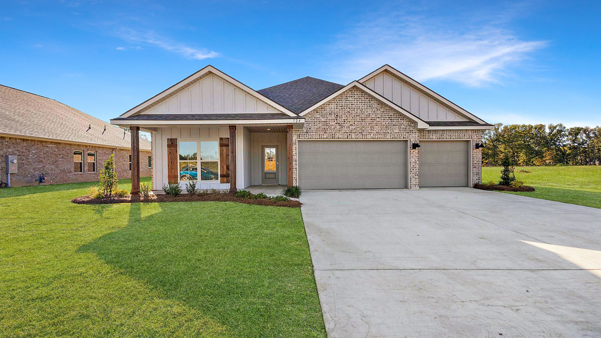 The Destin single-story home with a two-car garage., New home in Pearl, MS.