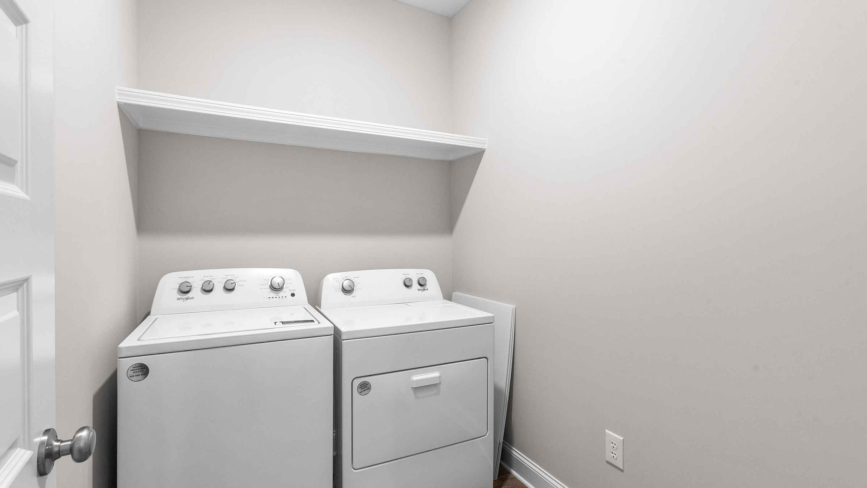 laundry room featuring side by side washer and dryer