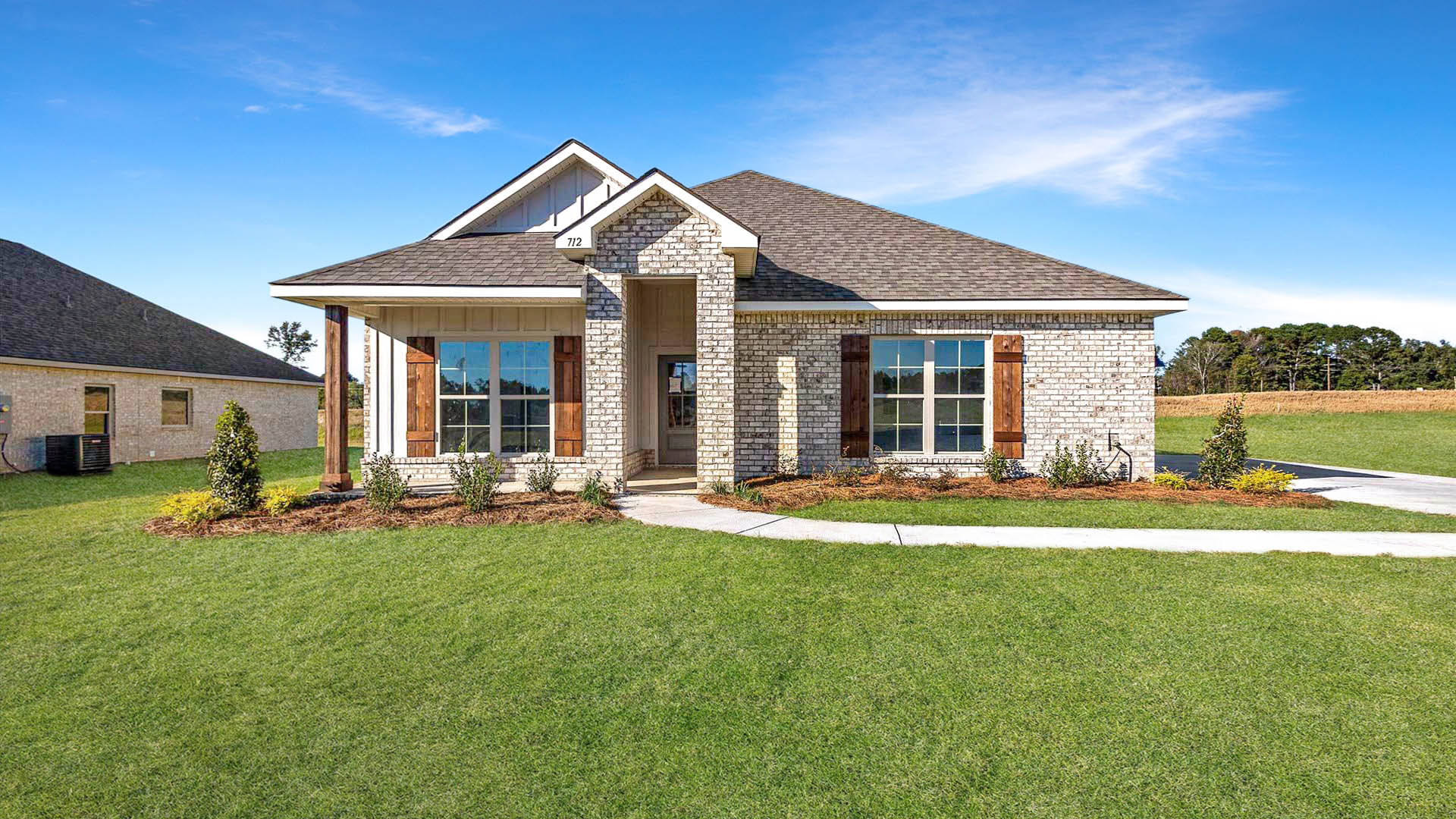 Lamar single story floorplan with 2 car garage in Woodgate