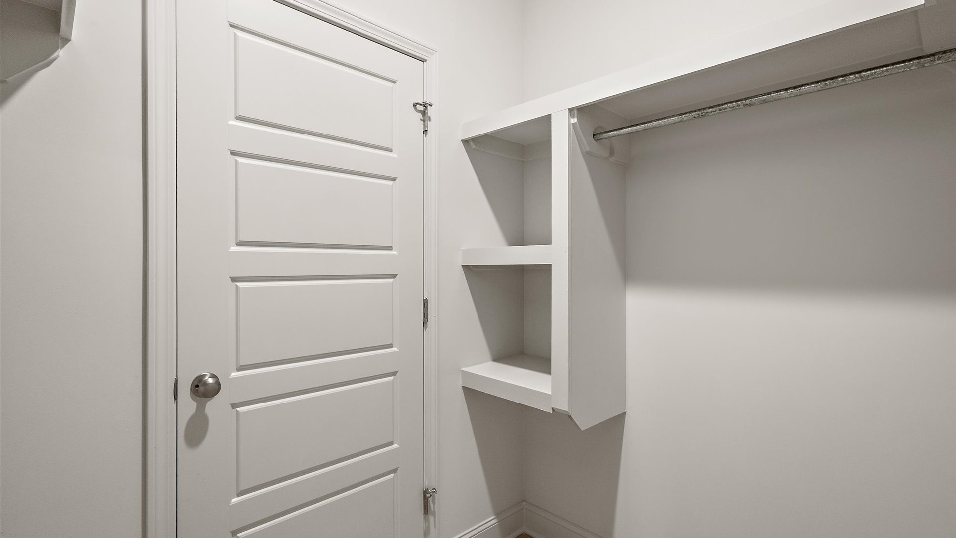 walk in closet in primary bathroom