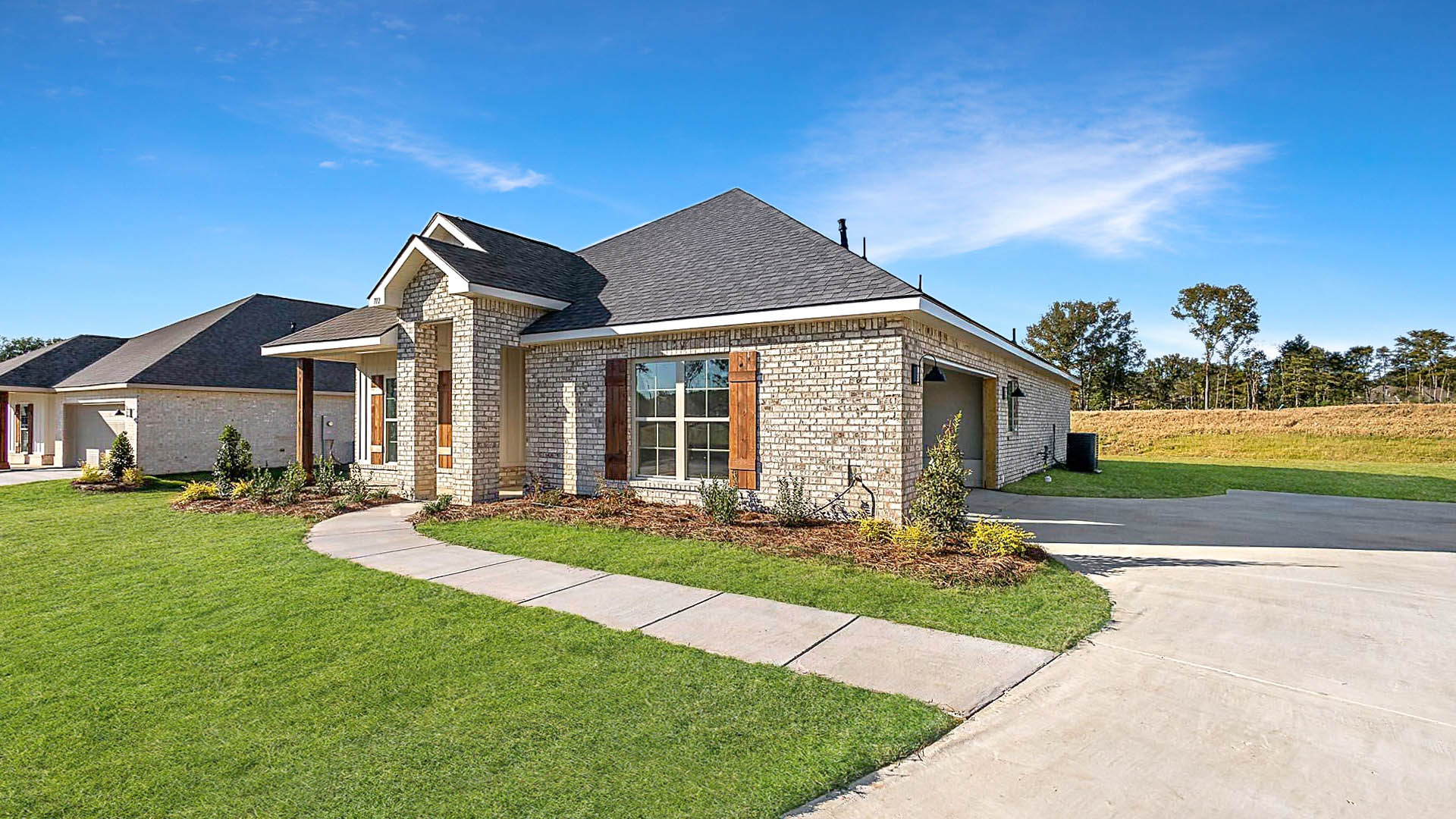 Lamar single story floorplan with 2 car garage in Woodgate