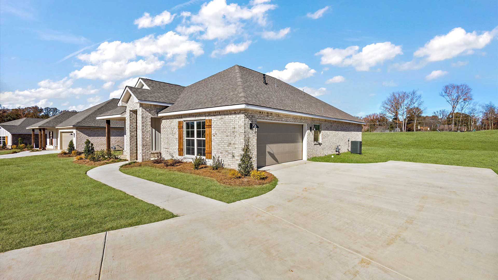 Lamar single story floorplan with 2 car garage in Woodgate