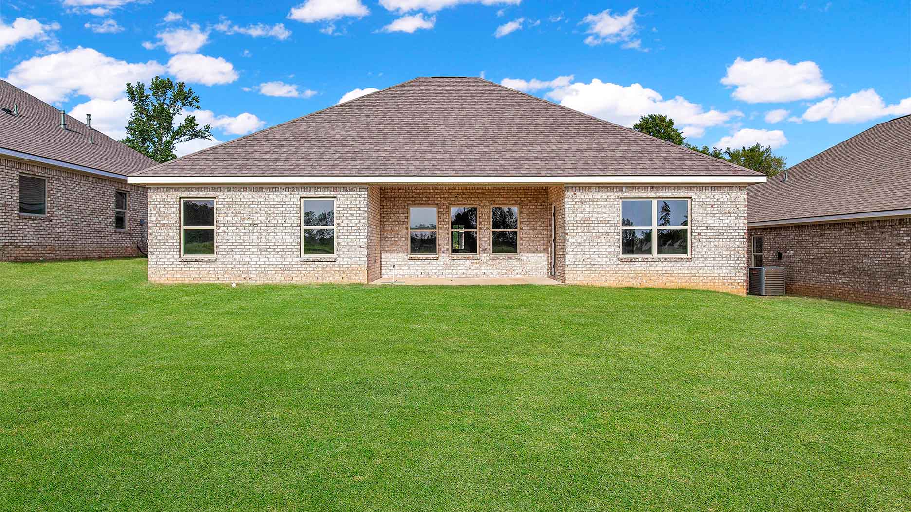 Patio looks out over greenspace