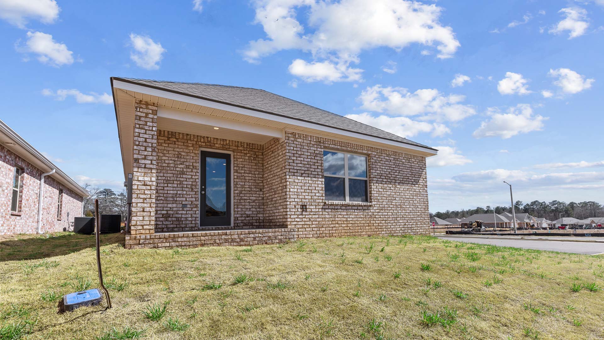 back patio opens up to greenspace