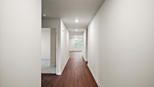 Foyer hallway leading into the home.