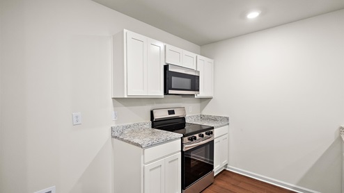 Kitchen where a fridge would go.