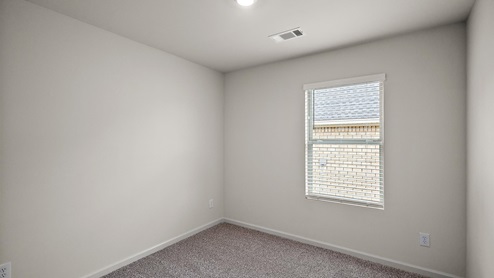 Bedroom with single window.