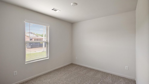 Bedroom with single window.