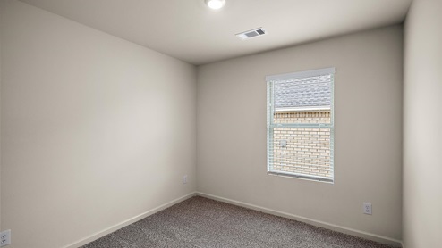 Bedroom with single window.