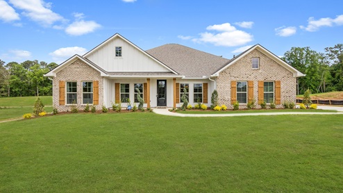 Exterior beige home with stone detailing