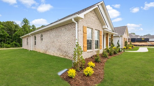 Exterior beige home with stone detailing