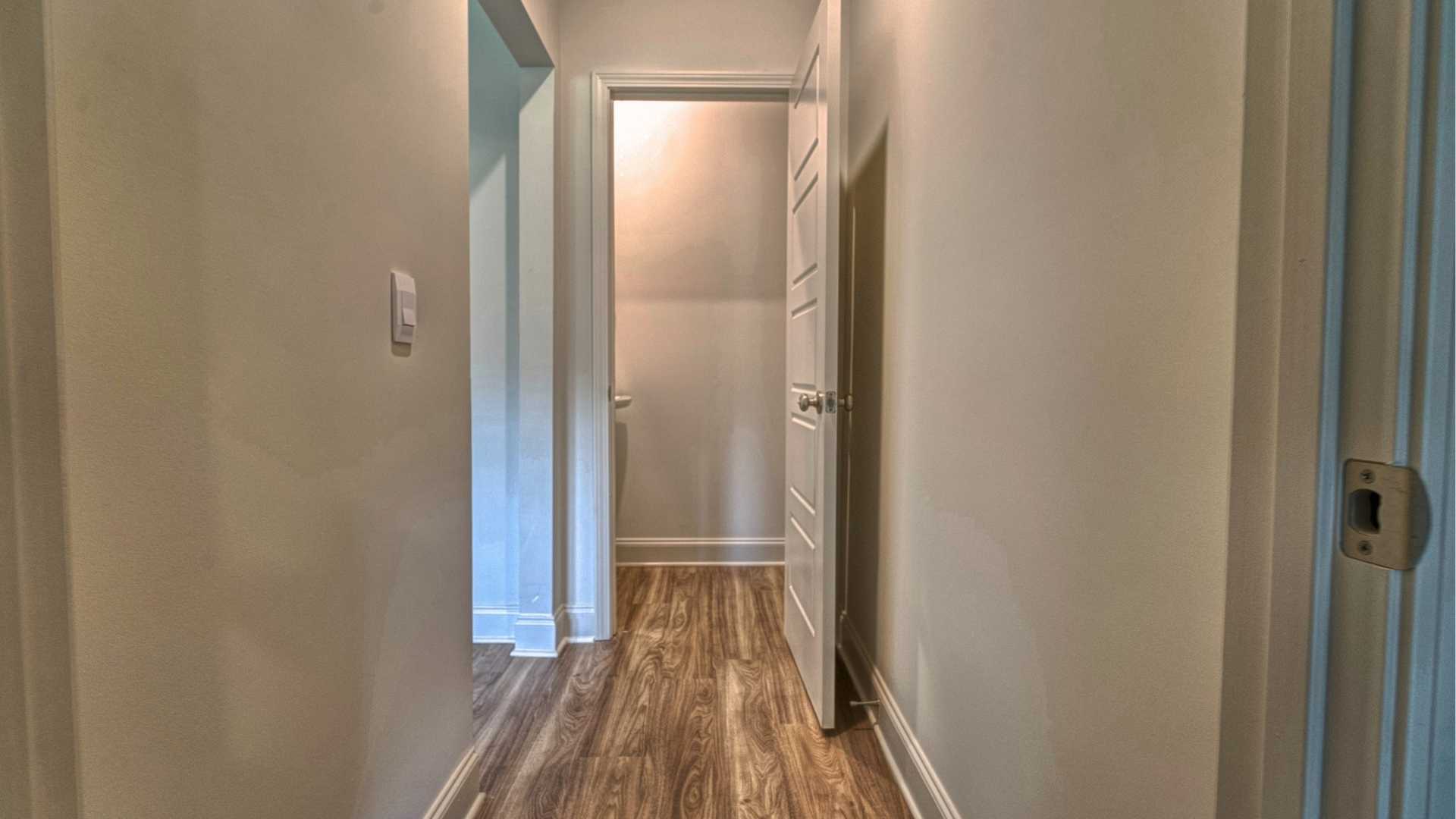 interior hall wall to multiple rooms