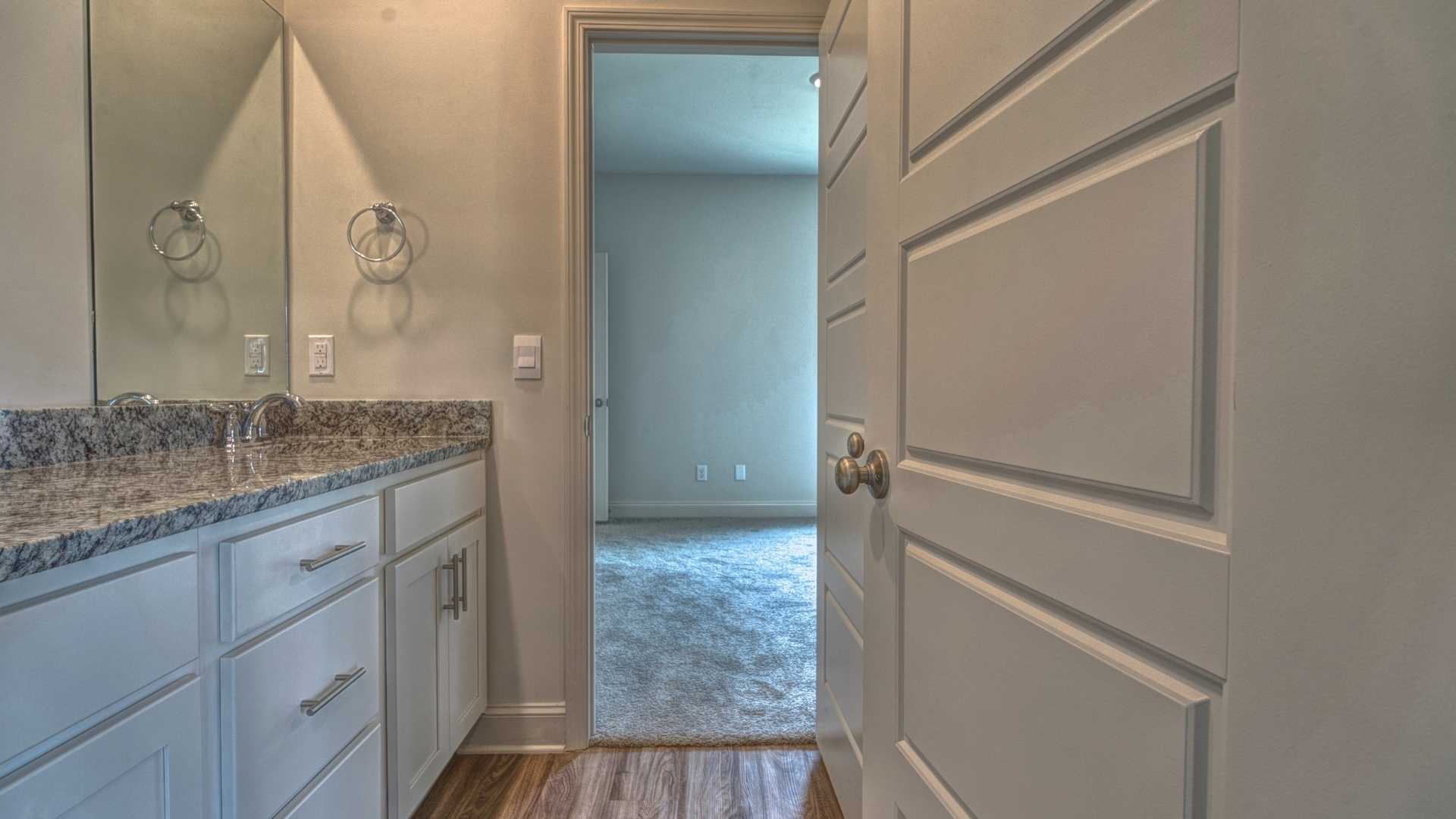 interior bathroom with double sinks