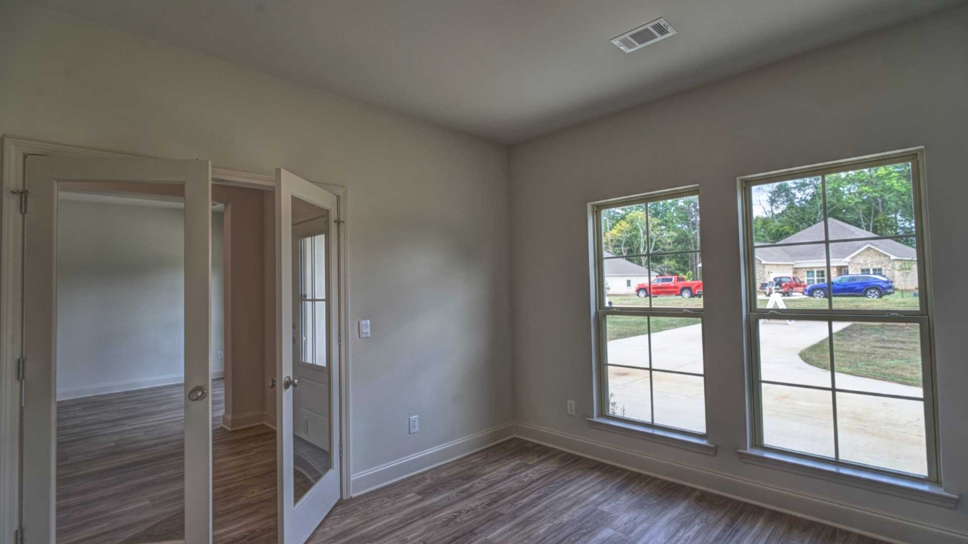interior office with double doors and large windows