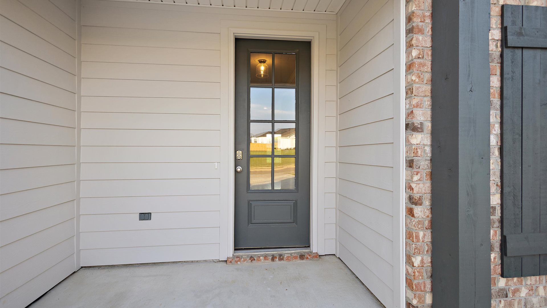 Front Door, foyer, flex office and access to this new residence bring you home with well-crafted and designed living