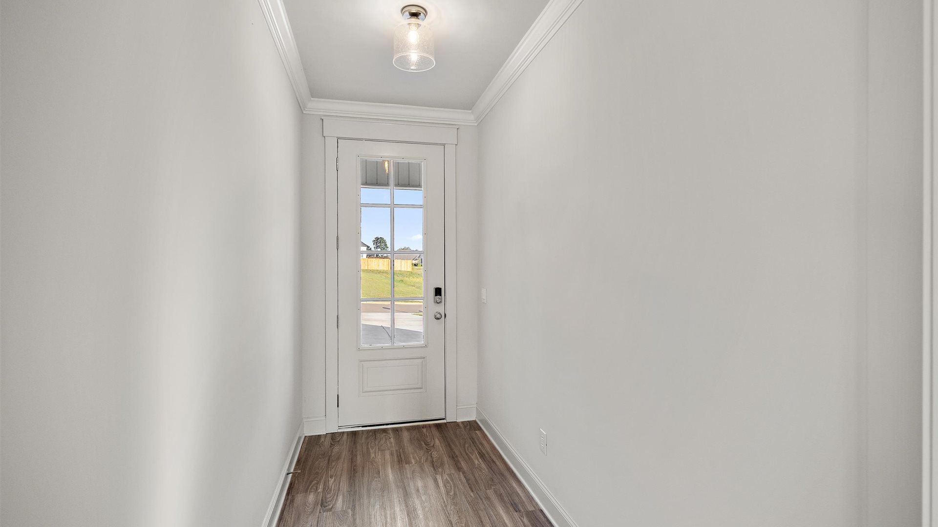 Front Door, foyer entry at the stairs, bringing you home to a well-crafted and designed living, dining, kitchen, and bedrooms