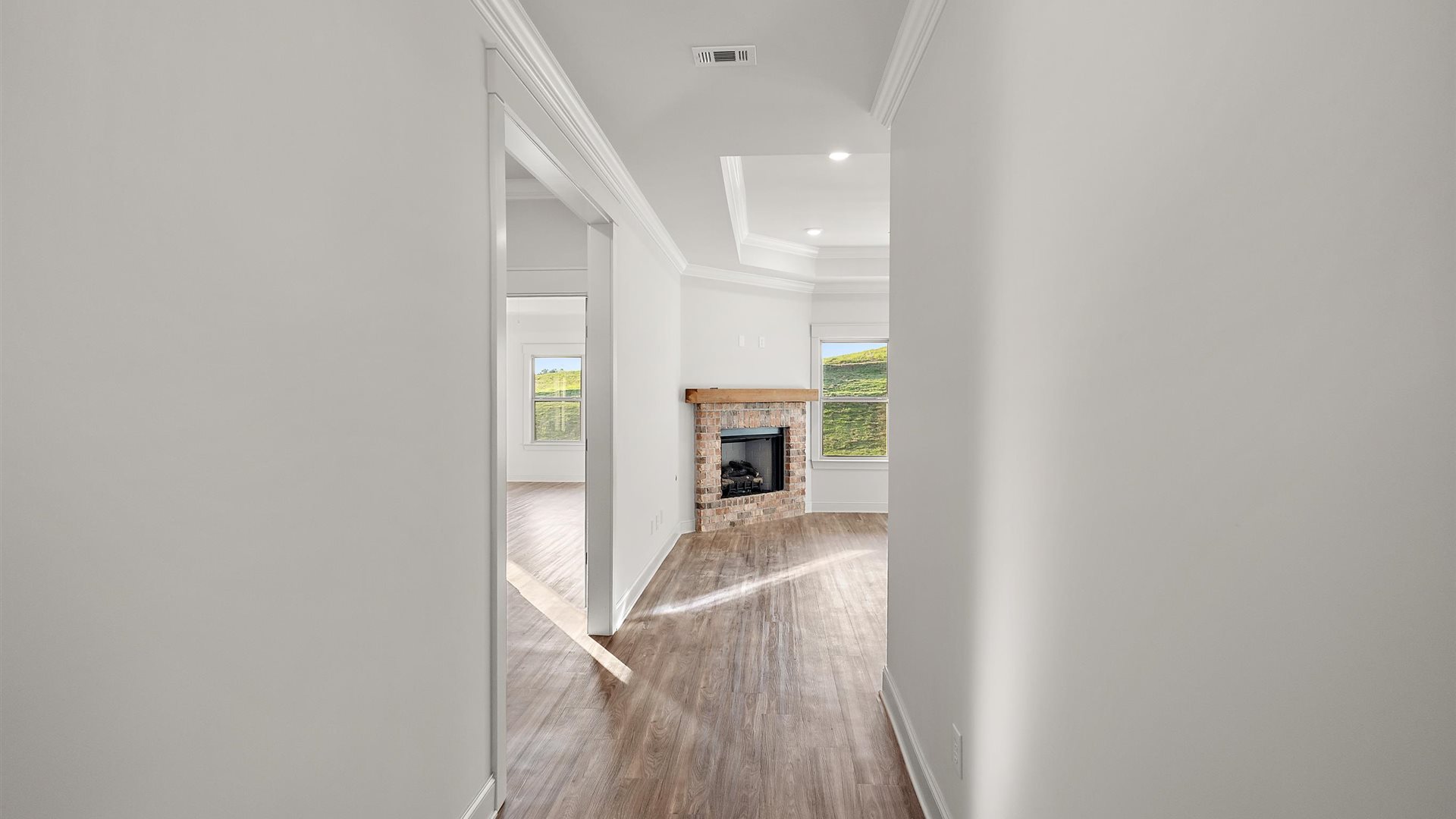 A foyer, entry hall inside front door, next to office, or sitting room adding a welcoming front, direct line of sight to home