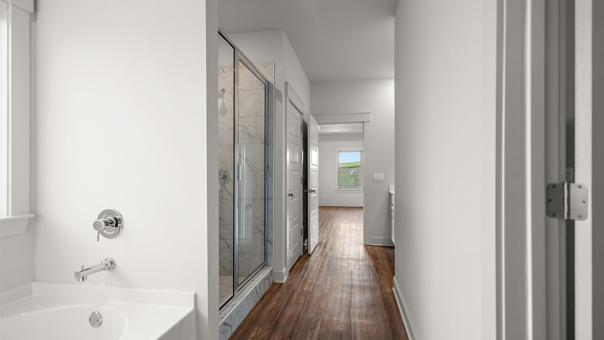 A foyer, entry hall inside front door, next to office, or sitting room adding a welcoming front, direct line of sight to home