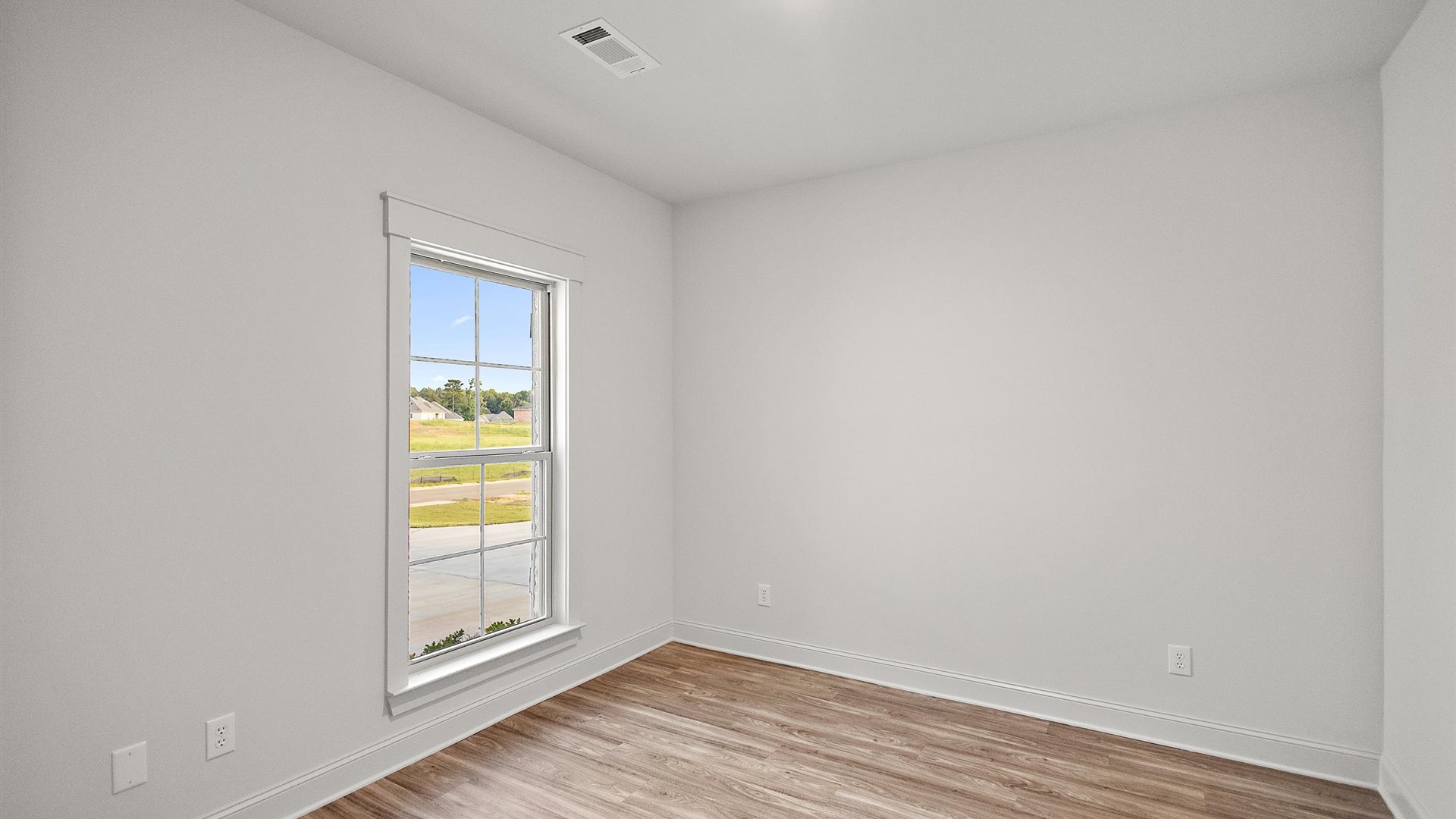 Second bedroom, flex-office, study, entertainment, game, craft room in this new construction D.R. Horton home