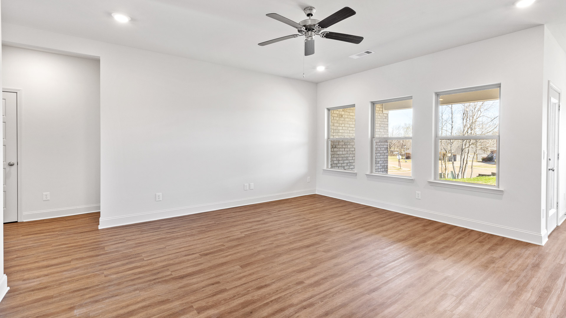 Living room with direct access to backyard.
