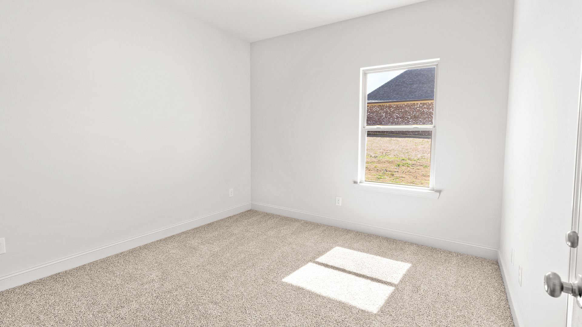 Bedroom with window for natural lighting.