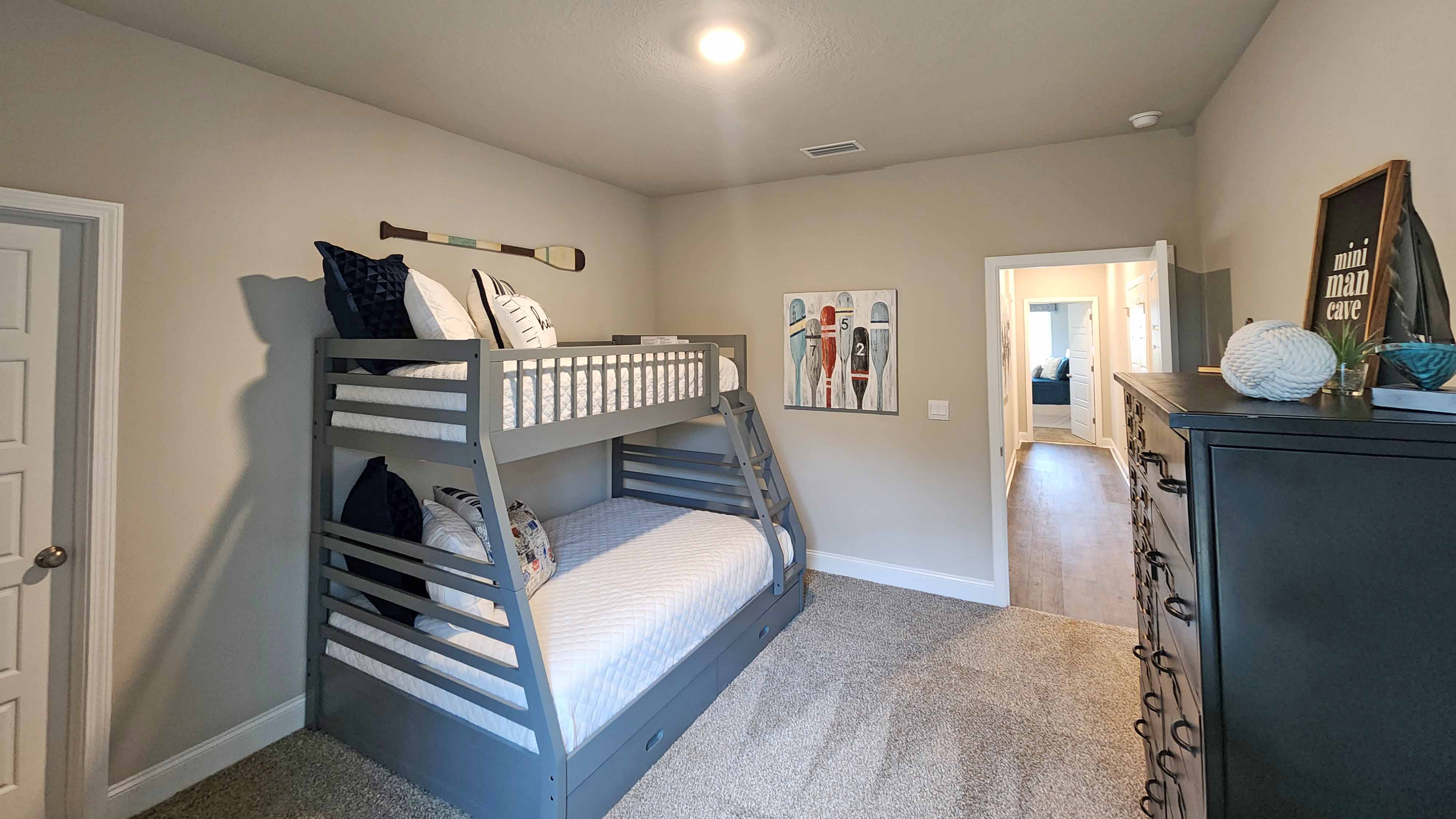 additional bedroom with carpet and recessed lighting