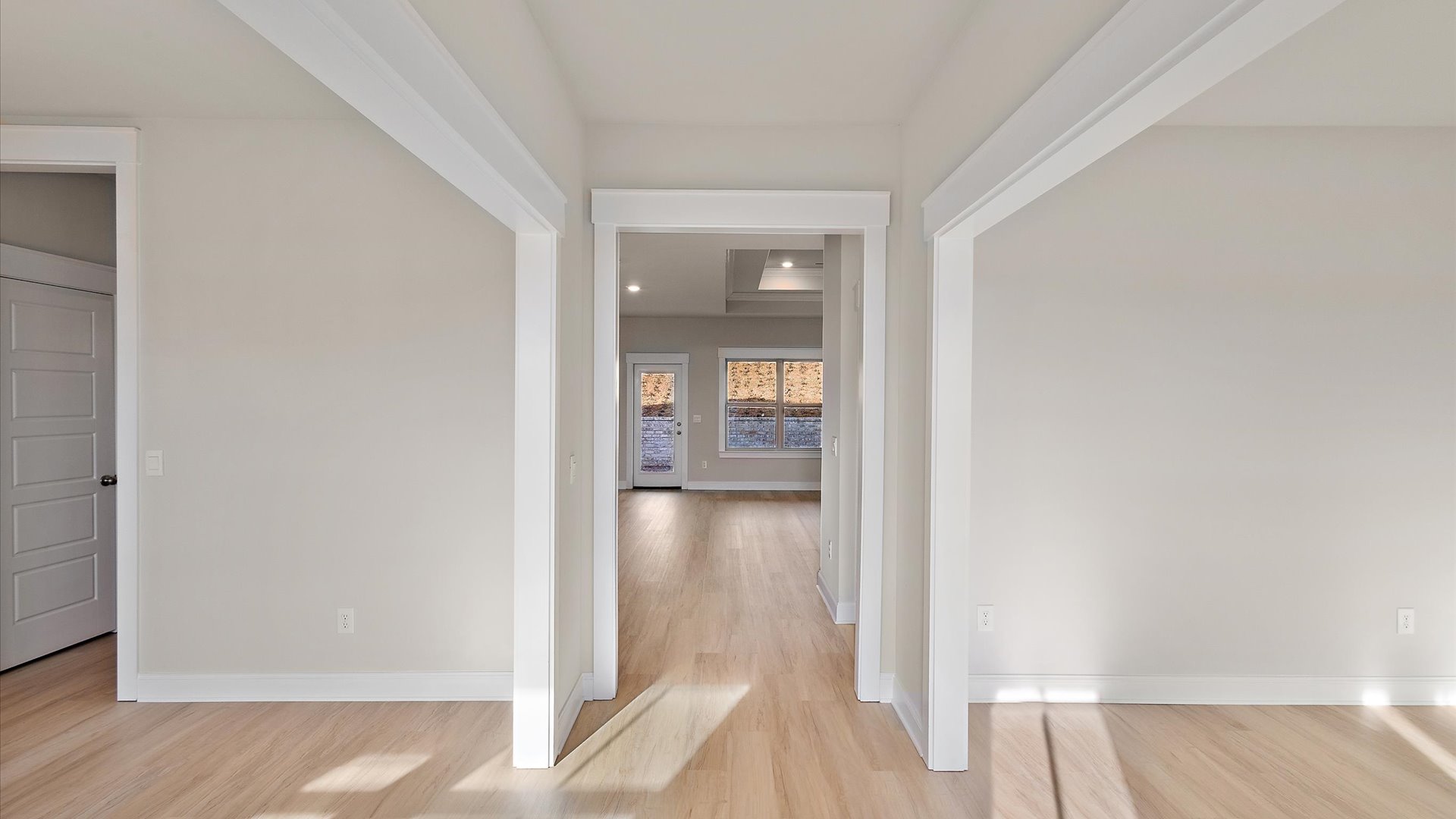 Front Door view from the foyer, entry hall inside front door, near office, or flex room adding a direct line of sight to home