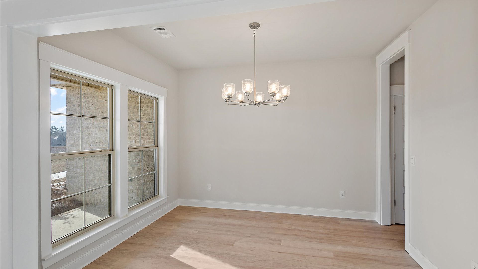 Dining room-multi purpose room showcases our stylish open concept connectivity to main areas, outdoors, front entry