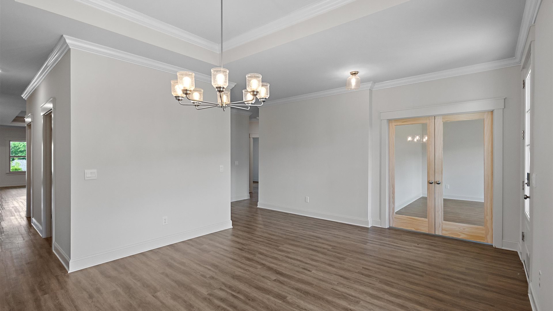 spacious dining room to the left of the entrance and a walk in office to the right