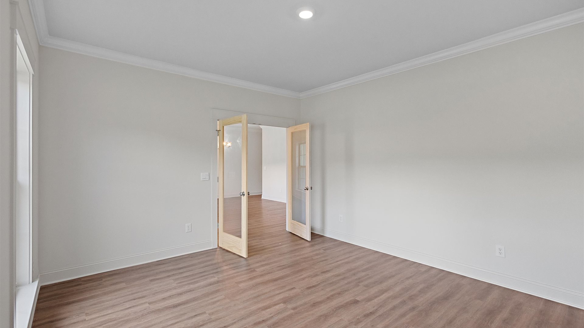 spacious walk in office with french doors
