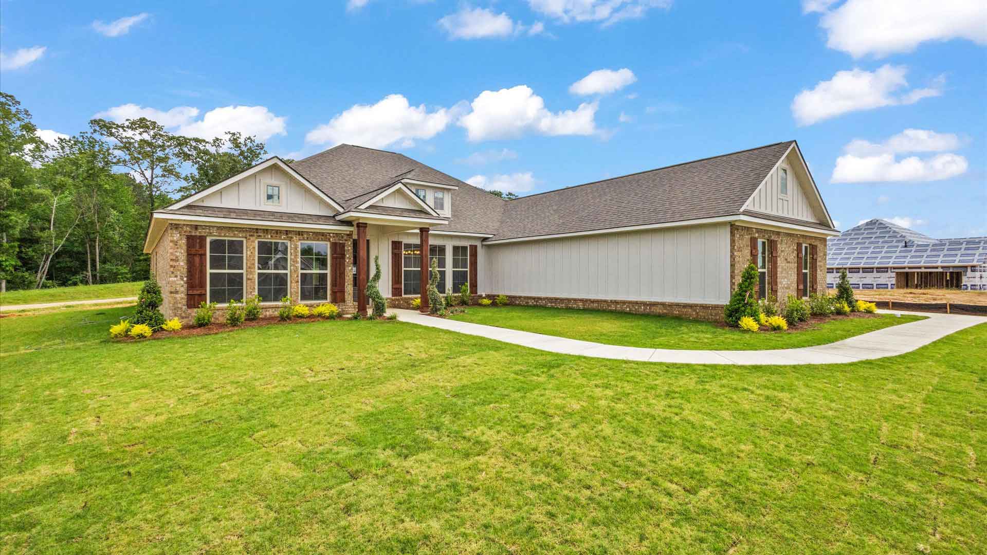 Exterior of one story home with two car garage