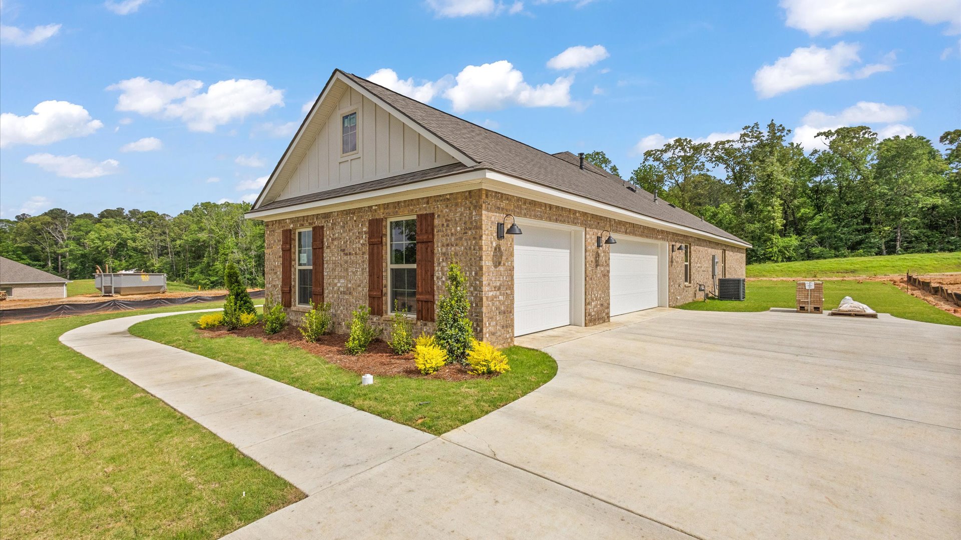 Exterior of one story home with two car garage
