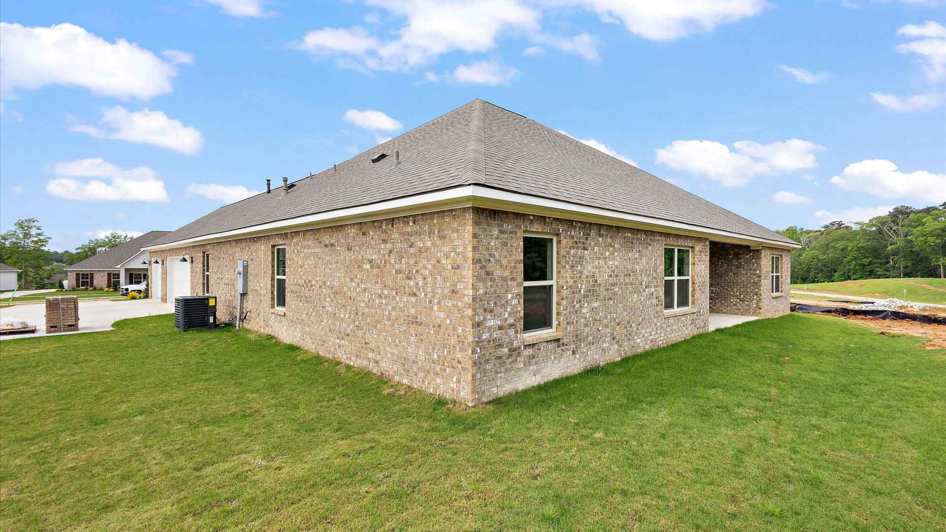 exterior of one story brick home