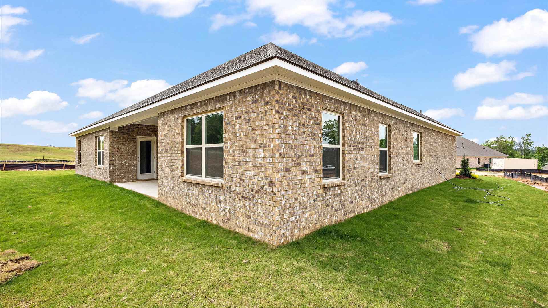 exterior of one story brick home