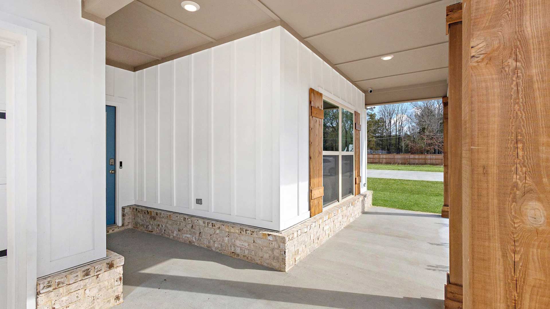 Our new residence front covered door-porch invites you Home to this well-crafted and designed new home Horseshoe Bend model