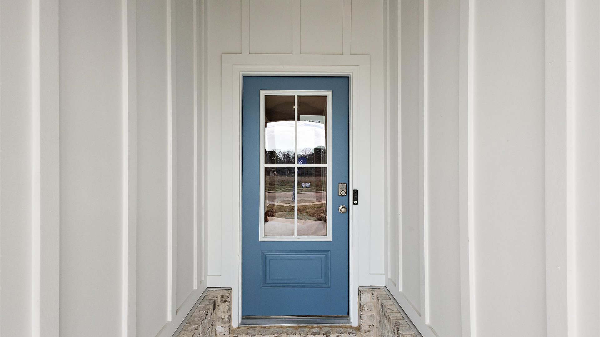 Exterior front door view from the front allows entry hall access inside front door, near office, or flex room adding a direct line of sight to home Horseshoe Bend