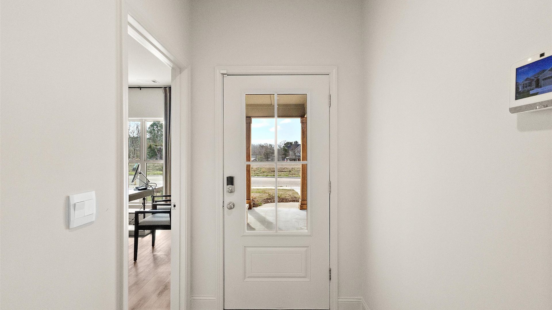 At Horseshoe Bend our foyer, entry hall inside front door, next to flex-office, sitting room, adds a welcoming direct line of sight home