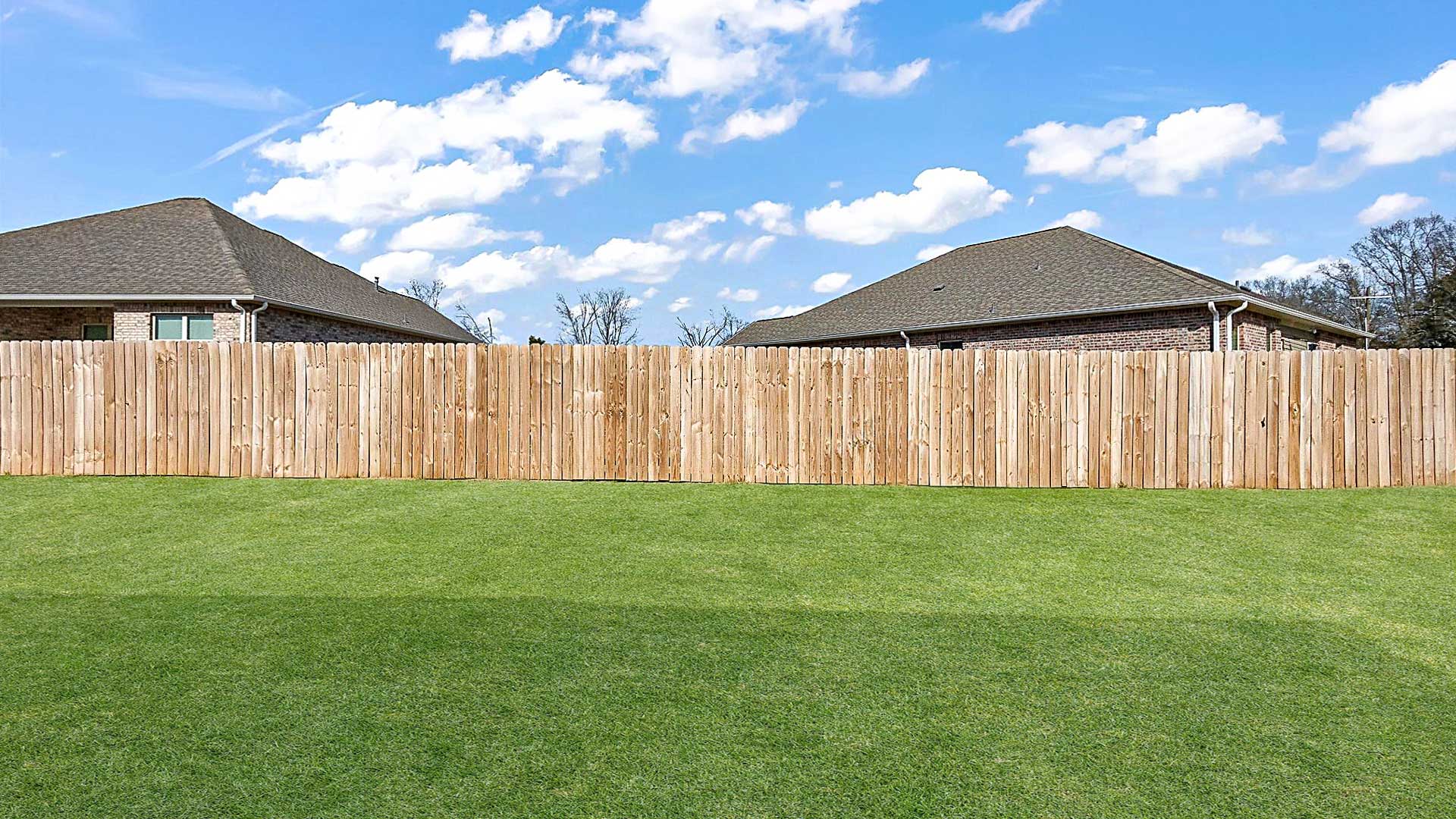 View from covered concrete patios with space for seating and grill setup Horseshoe Bend By D.R. Horton