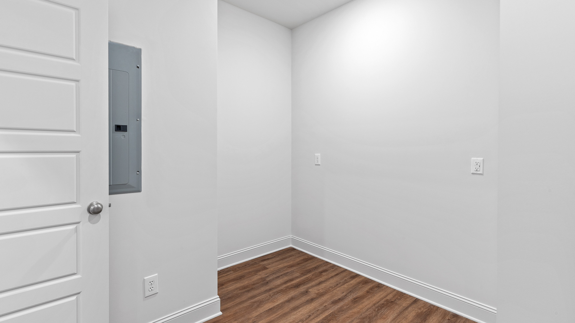 laundry room with wooden shelf for storage