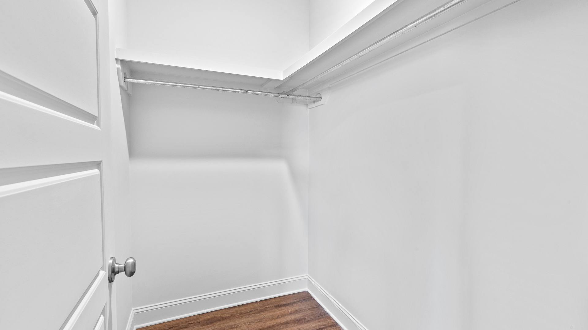closet space with wooden shelving