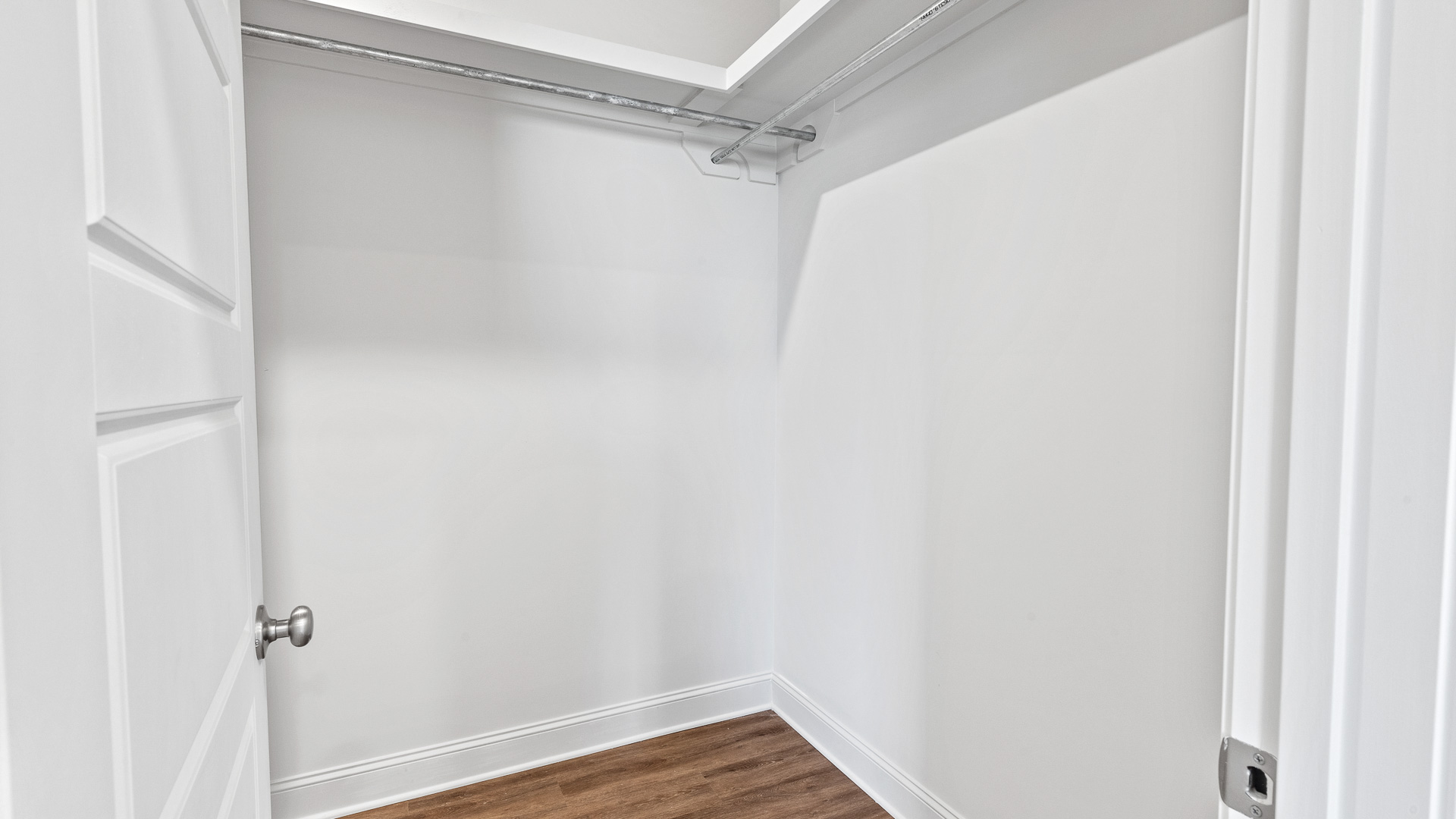 walk-in closet space in primary bedroom