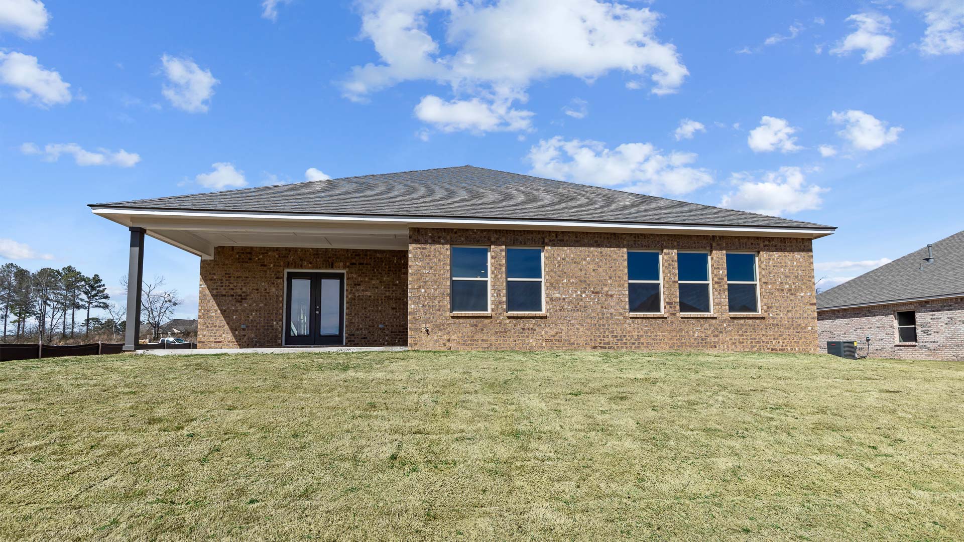 back patio opening up into greenspace