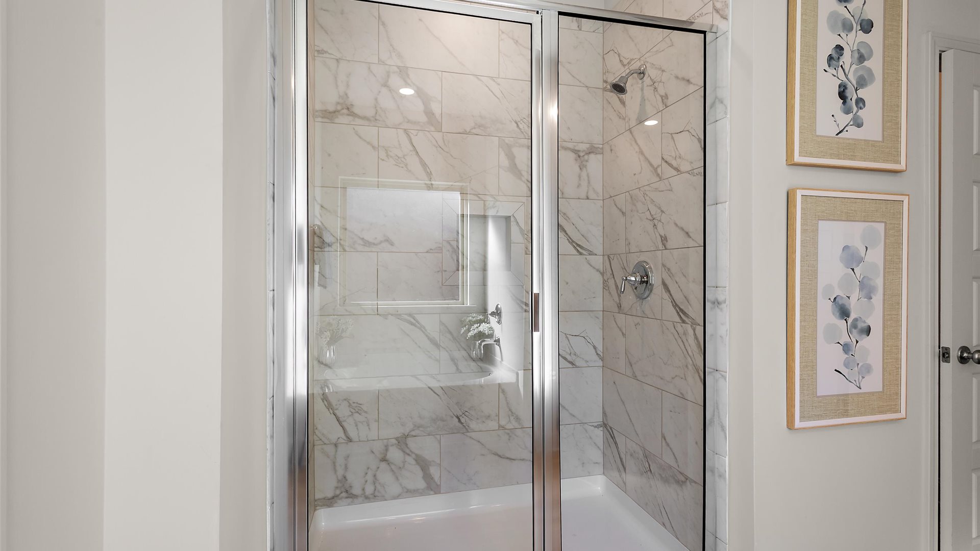 Walk in shower with built in shelving