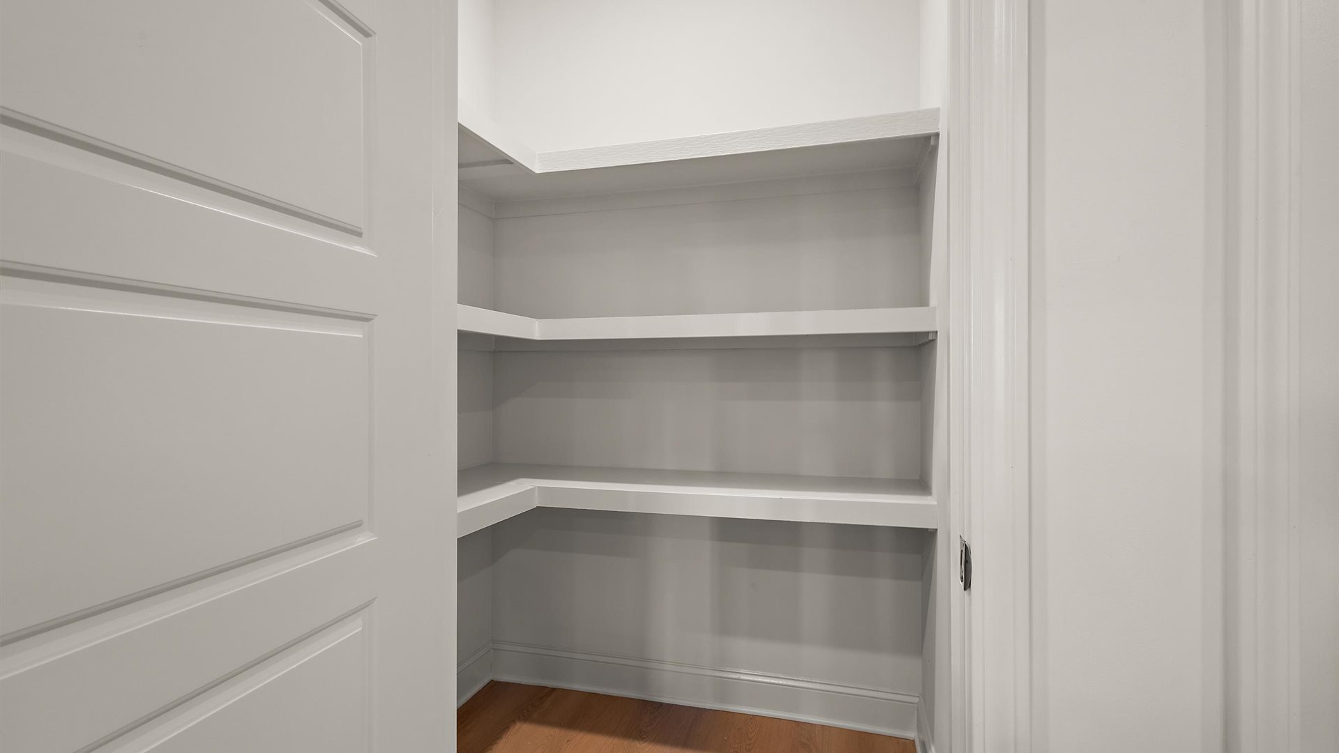 Pantry with wooden shelving