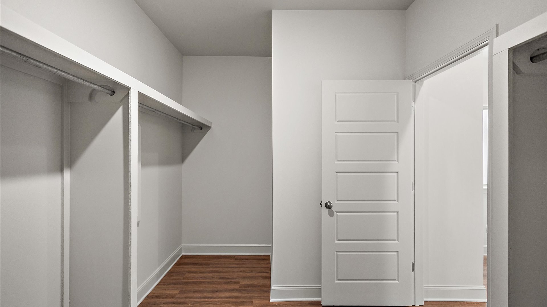 Sizable walk-in closet in primary bathroom.